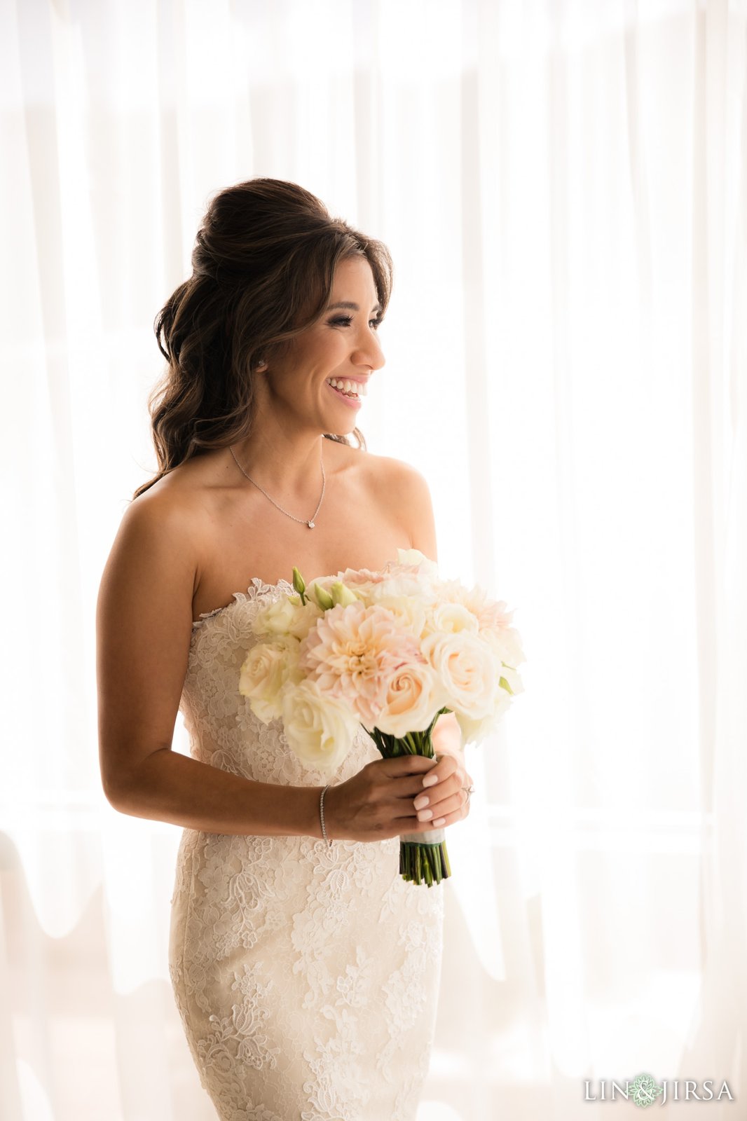 Bride with a lush blush bouquet